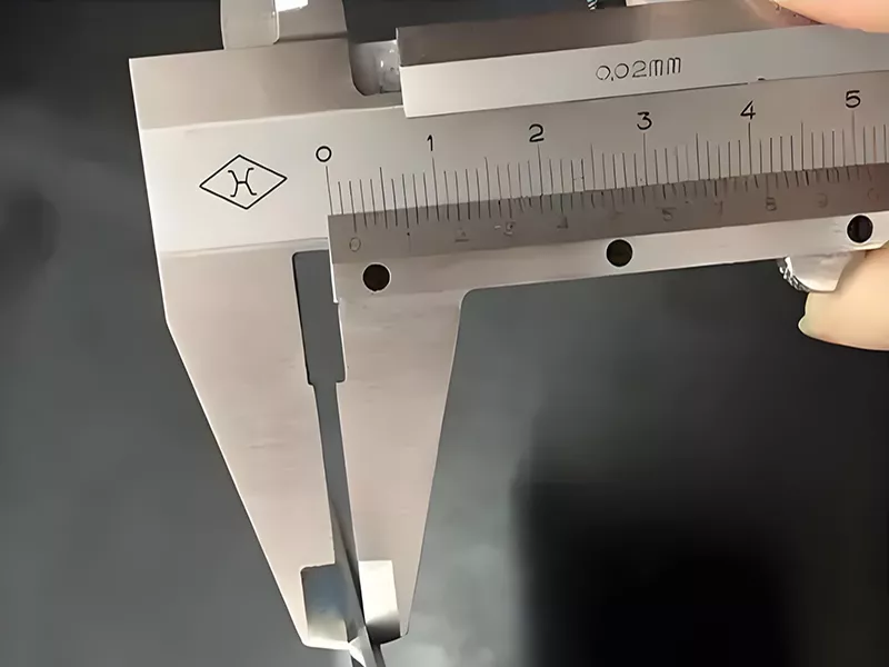 Thickness measurement inspection for transformer aluminum strip